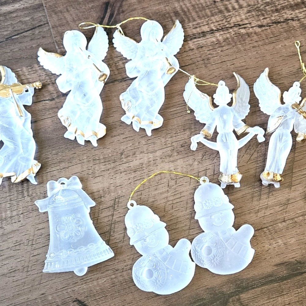 Eight Marshall Fields Plastic Christmas Tree Ornaments.